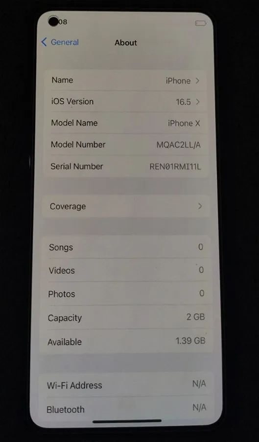 Menu des paramètres des informations système sur un Redmi Note 12 qui émule l'apparence d'iOS et d'iPhone X.